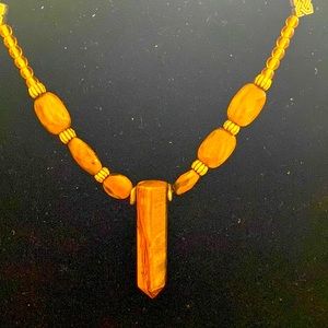 Tigers eye stones, beads.  Gold tones.